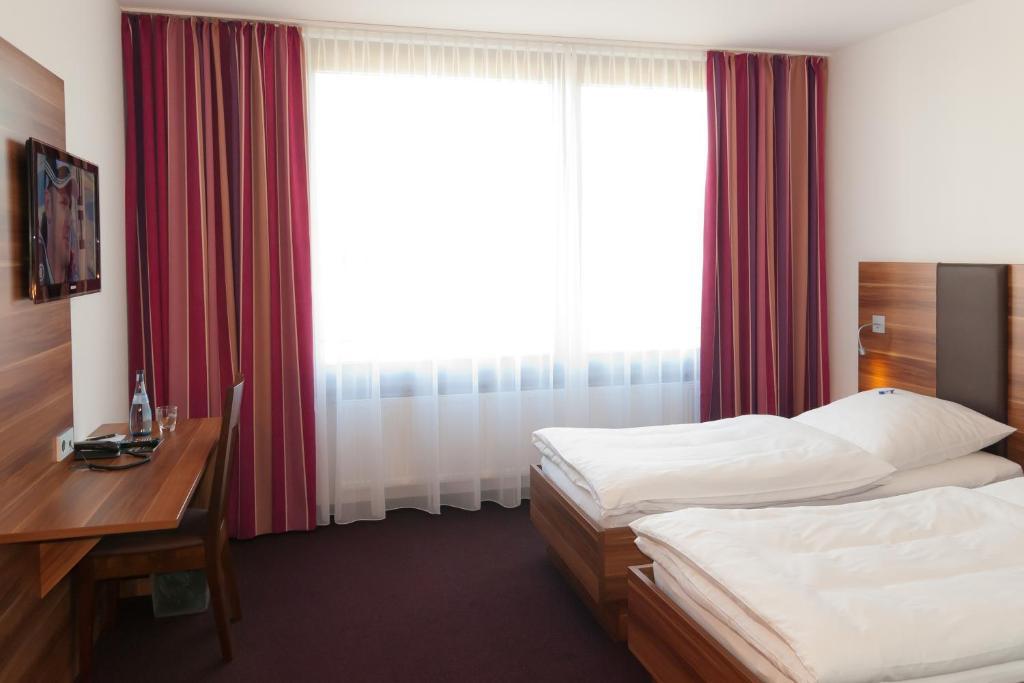 Hotel Sentio Vöhringen Rum bild